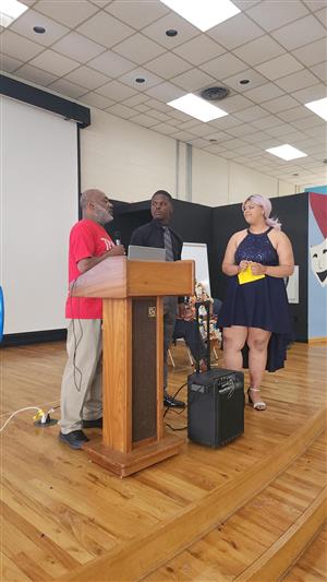 social worker giving awards to students